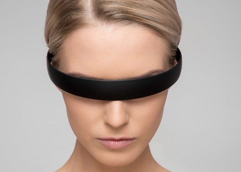 woman wearing black Alice band