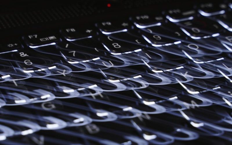 a close up of a computer keyboard on a table