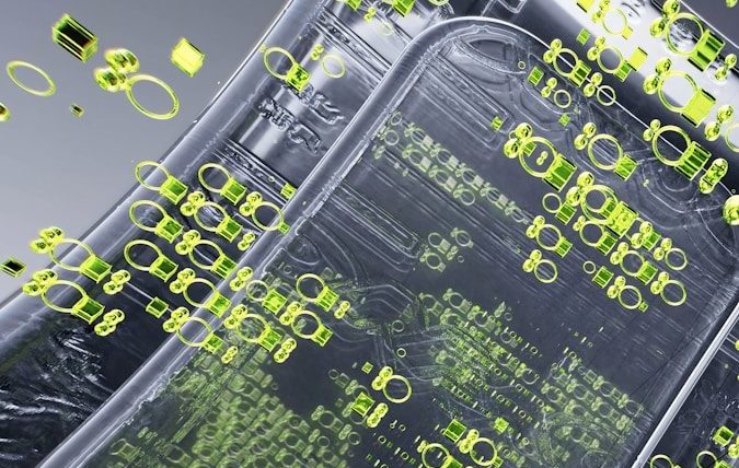 a cell phone with a lot of green dots on it