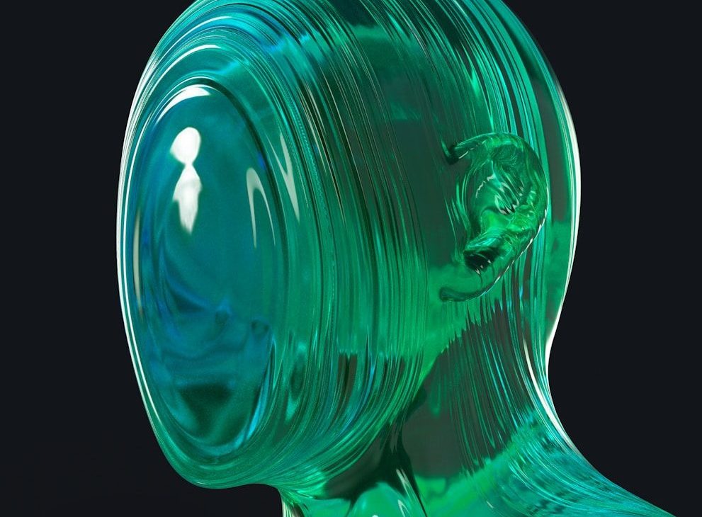 A glass sculpture of a woman's head and shoulders